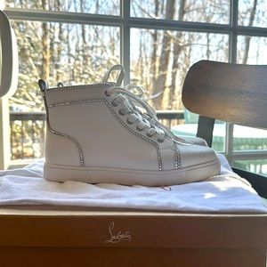 Womens Louboutin hightop sneaker white leather with crystal accents. Size 8.